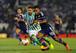Lacazette charges at the Real Betis defense.