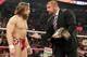 Triple H strips Daniel Bryan of his WWE Championship.
