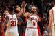 Chicago Bulls forwards Jimmy Butler and Carlos Boozer exchange salutations.