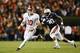 Auburn's Dee Ford (No. 30) would do much of the same for the 49ers—that is, chasing quarterbacks from behind.