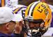 Les Miles embraces LSU quarterback Anthony Jennings before the Outback Bowl against Iowa.