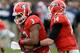 Georgia QB Hutson Mason hands the ball to RB Todd Gurley.