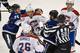 Montreal Canadiens forward Travis Moen (left) and Tampa Bay Lightning defenseman (Radko Gudas) get separated.