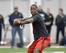 Louisville quarterback Teddy Bridgewater participates in a passing drill for NFL representatives during pro day at the University of Louisville in Louisville, Ky., Monday, March 17, 2014. (AP Photo/Timothy D. Easley)