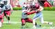 Skai Moore (10) brings down Devin Potter in the spring game.