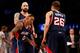 Atlanta Hawks center Pero Antic and guard Kyle Korver celebrate with guard Jeff Teague.