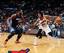 Cartier Martin makes a move against Charlotte Bobcats forward Michael Kidd-Gilchrist