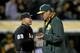 Is Bob Melvin discussing the plumbing, rain or instant replay?