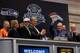 Jets owner Woody Johnson and Broncos general manager John Elway partner up for a draft-day trade in this scenario.