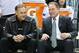 Michigan State head football coach Mark Dantonio visits with basketball coach Tom Izzo in January.