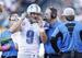 New offensive coordinator Scott Linehan (second from right) hopes to have the same success he enjoyed with the fearsome Detroit Lions offense.