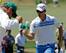 Justin Rose celebrates a bit at the Masters.