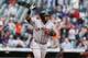 Hector Sanchez celebrates his Grand Slam to help the Giants defeat the Rockies.