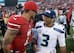 Quarterbacks Colin Kaepernick (left) and Russell Wilson (right) will have to wait until Week 13 to square off in 2014.