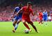 Phillipe Coutinho battles Chelsea's Ashley Cole for the ball in Sunday's Anfield defeat.