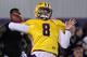 Zach Mettenberger chose to throw with helmet and shoulder pads at LSU's pro day.