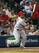 Yadier Molina gets a hit against the Braves on May 6.