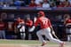 Oscar Taveras gets a hit in a spring training game against the Mets on March 7.
