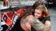 Bray Wyatt embraces a young follower.