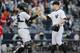 In an Apr. 26, 2014 win against the Angels, No. 3 prospect, catcher John Ryan Murphy (left), hit his first MLB home run and caught David Robertson's third save on the year.