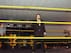 Yoshi Tatsu handles the ring announcing duties at an NXT live event.