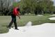 This bunker shot at Doral was particularly painful for Tiger Woods.