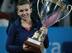 Simona Halep raises the winning trophy from the Sofia Cup in 2013.