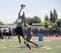 Isaiah Langley (yellow socks) snags an interception during drills on Sunday.