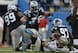 Pro-Bowl end Greg Hardy (middle) and 2013 rookie tackle Kawann Short (left)