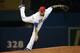 TORONTO, CANADA - MAY 9: Sergio Santos #21 of the Toronto Blue Jays delivers a pitch in the seventh inning during MLB game action against the Los Angeles Angels of Anaheim on May 9, 2014 at Rogers Centre in Toronto, Ontario, Canada. (Photo by Tom Szczerb