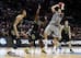 McDermott hoisting a shot against Baylor.