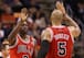 PHOENIX, AZ - NOVEMBER 14: Luol Deng #9 and Carlos Boozer #5 of the Chicago Bulls high five after scoring against the Phoenix Suns during the NBA game at US Airways Center on November 14, 2012 in Phoenix, Arizona. The Bulls defeated the Suns 112-106 in