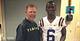LSU offensive coordinator Cam Cameron (left) and QB recruit Torrance Gibson (right).
