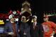 Cardinals' GM John Mozeliak hoists the Warren C. Giles trophy after winning the NL pennant in 2013.