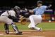 Young Yankee backstop John Ryan Murphy—seen here in a play at the plate involving the Rays' James Loney, Tropicana Field, Apr. 20—went just 2-for-7 but collected an RBI and continued his errorless streak.