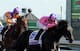 Robby Albarado (left) finishing second aboard Medal Count in the Blue Grass Stakes.