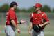 Manager Mike Matheny instructing Carson Kelly during spring training in March
