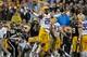 LSU safety Jalen Mills celebrates against Iowa in the 2014 Outback Bowl.