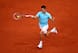 Novak Djokovic moves into his forehand during an early-round match at the 2014 French Open.