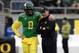 QB Marcus Mariota and coach Mark Helfrich