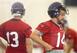T.J. Yates (13) and Ryan Fitzpatrick (14) are in the Houston Texans' four-way quarterback competition.