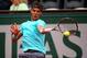 Rafael Nadal strikes the ball during his fourth-round match at the 2014 French Open.