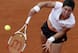 Carla Suarez Navarro serves during her quarterfinals match at the 2014 French Open.