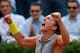 Sara Errani celebrates French Open victory over Jelena Jankovic.