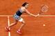 Jelena Jankovic readies for backhand during match at 2014 French Open.