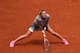 Petra Kvitova slides during her match against Svetlana Kuznetsova at the 2014 French Open.