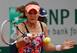 Agnieszka Radwanska concentrates on her shot during a match at the 2014 French Open.