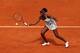 Venus Williams prepares to volley in her first-round match of the 2014 French Open.