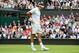 Roger Federer appears frustrated in his match during the 2013 Wimbledon championships.