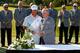 Hideki Matsuyama receives the 2014 Memorial trophy from Jack Nicklaus.